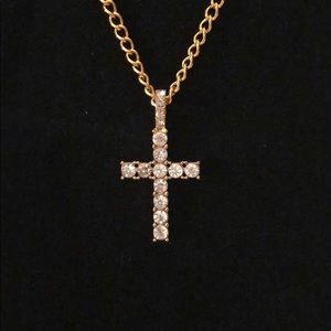 Gold tone cross necklace with simulated diamonds